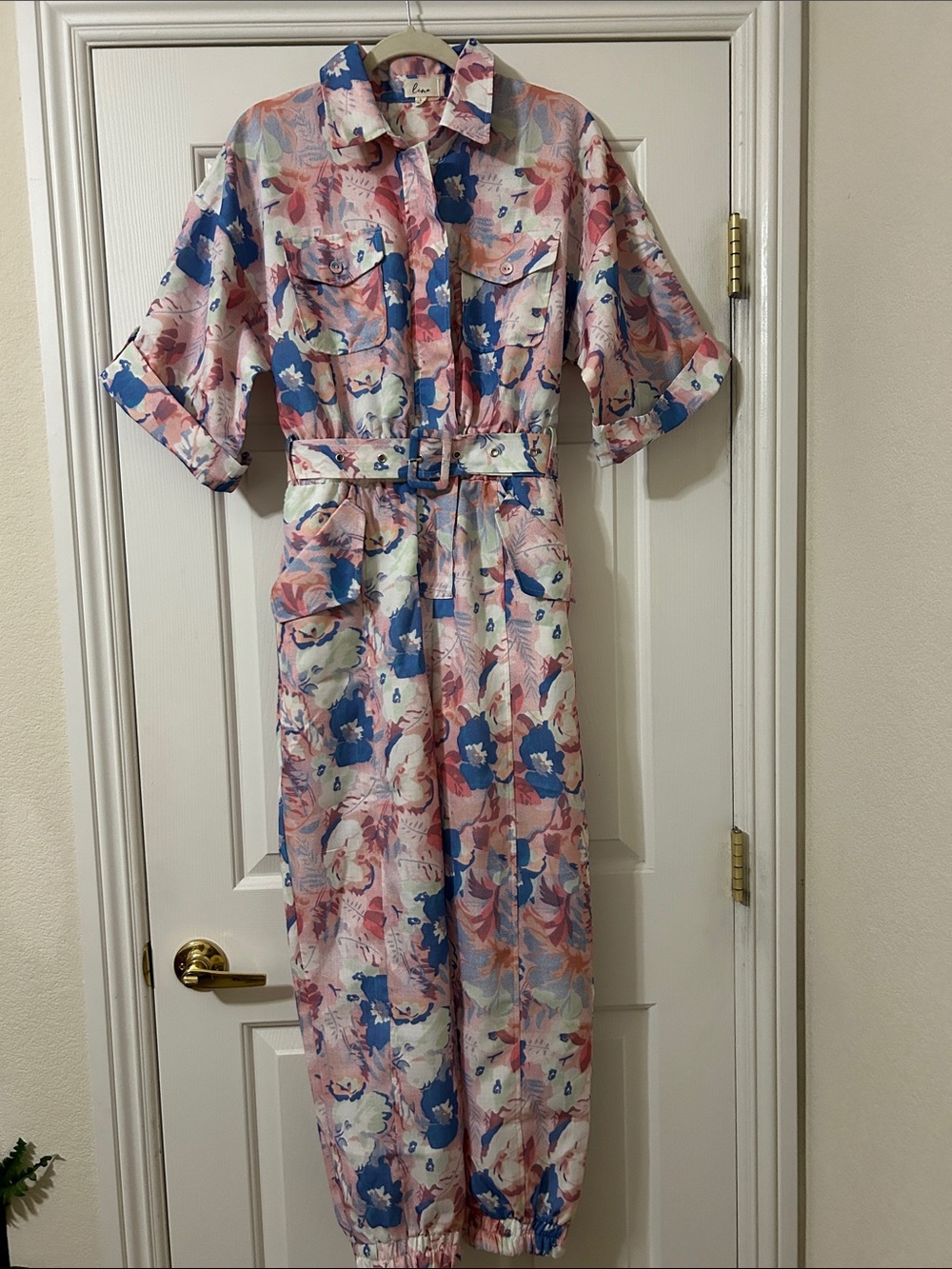 Lena watercolor floral belted jumpsuit with cuffed ankles. Women’s Size Large.